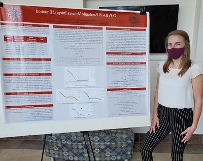 Student presents poster at Student Academic Showcase and Honors event